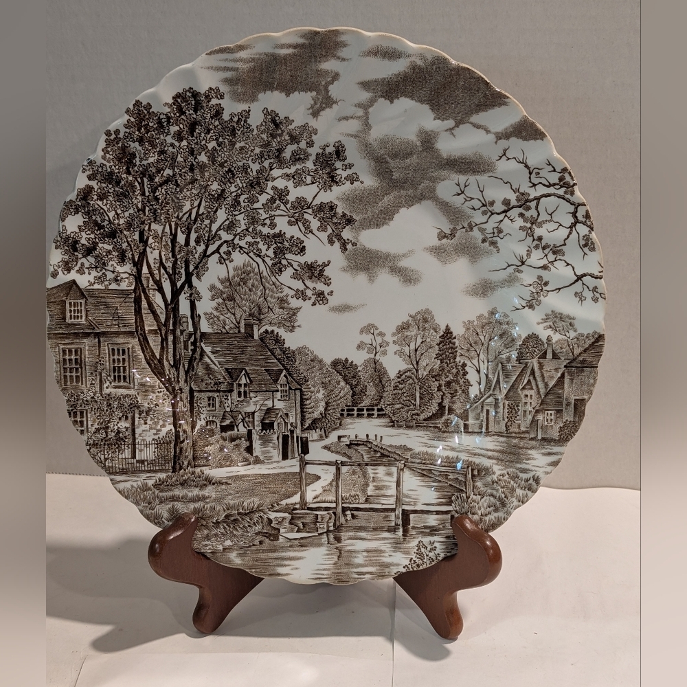 Johnson Brothers Cotswold dinner plate, featuring a brown village scene pattern